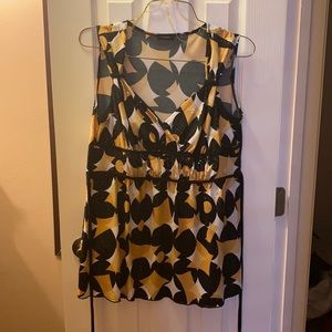 Maternity blouse color black gold yellow white.